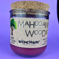 Recycled glass candle jar with cork lid, purple wax, WicksNWax label centered.