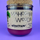 Recycled glass candle jar with cork lid, purple wax, WicksNWax logo and label.