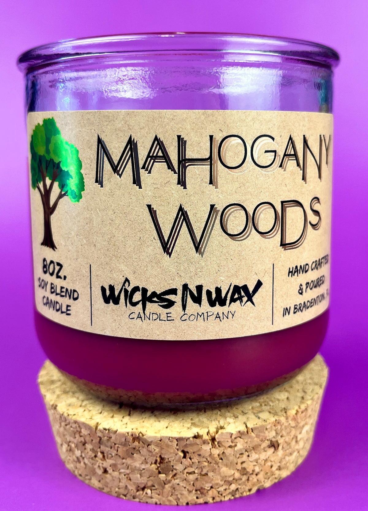 Recycled glass candle with burgundy wax, cork base, Mahogany Woods label