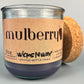 Mulberry WicksNWax upcycled bottle candle in clear glass jar, cork base and label