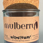 Mulberry WicksNWax upcycled bottle candle in clear glass jar, label with dark wax
