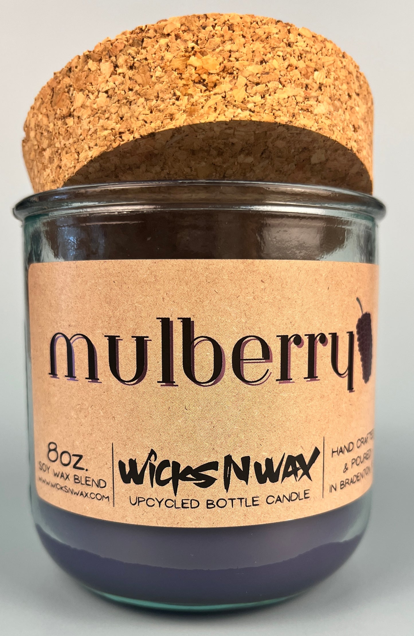 Mulberry WicksNWax upcycled bottle candle in clear glass jar, full label and cork top