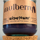 Mulberry WicksNWax upcycled bottle candle in clear glass jar with cork base