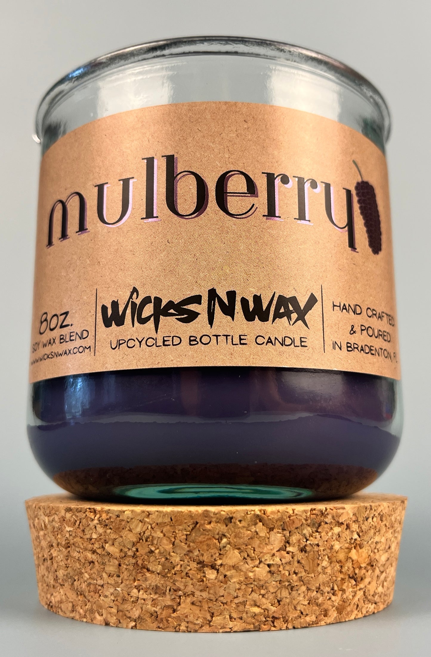 Mulberry WicksNWax upcycled bottle candle in clear glass jar with cork base