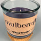 Mulberry WicksNWax upcycled bottle candle in clear glass jar, side label and dark wax