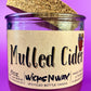 Mulled Cider recycled glass candle with cork lid, purple wax, close front view