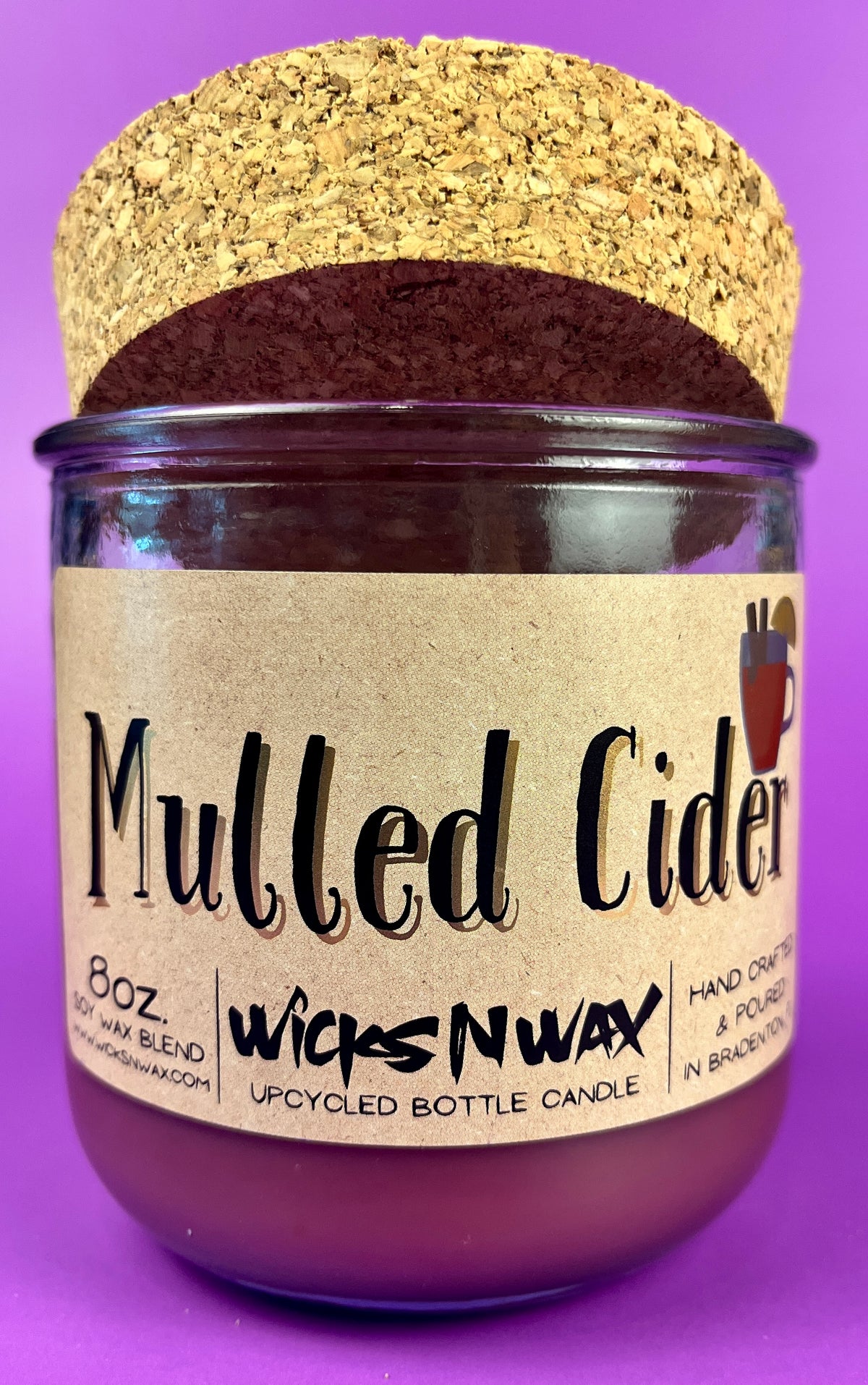 Mulled Cider recycled glass candle with cork lid, purple wax, front label
