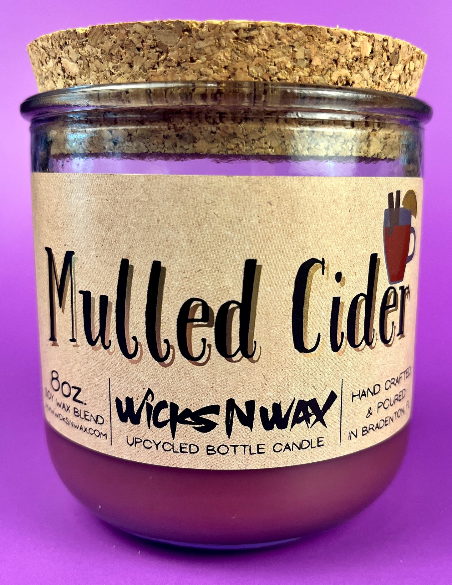 Mulled Cider recycled glass candle with cork lid, purple wax, centered front label