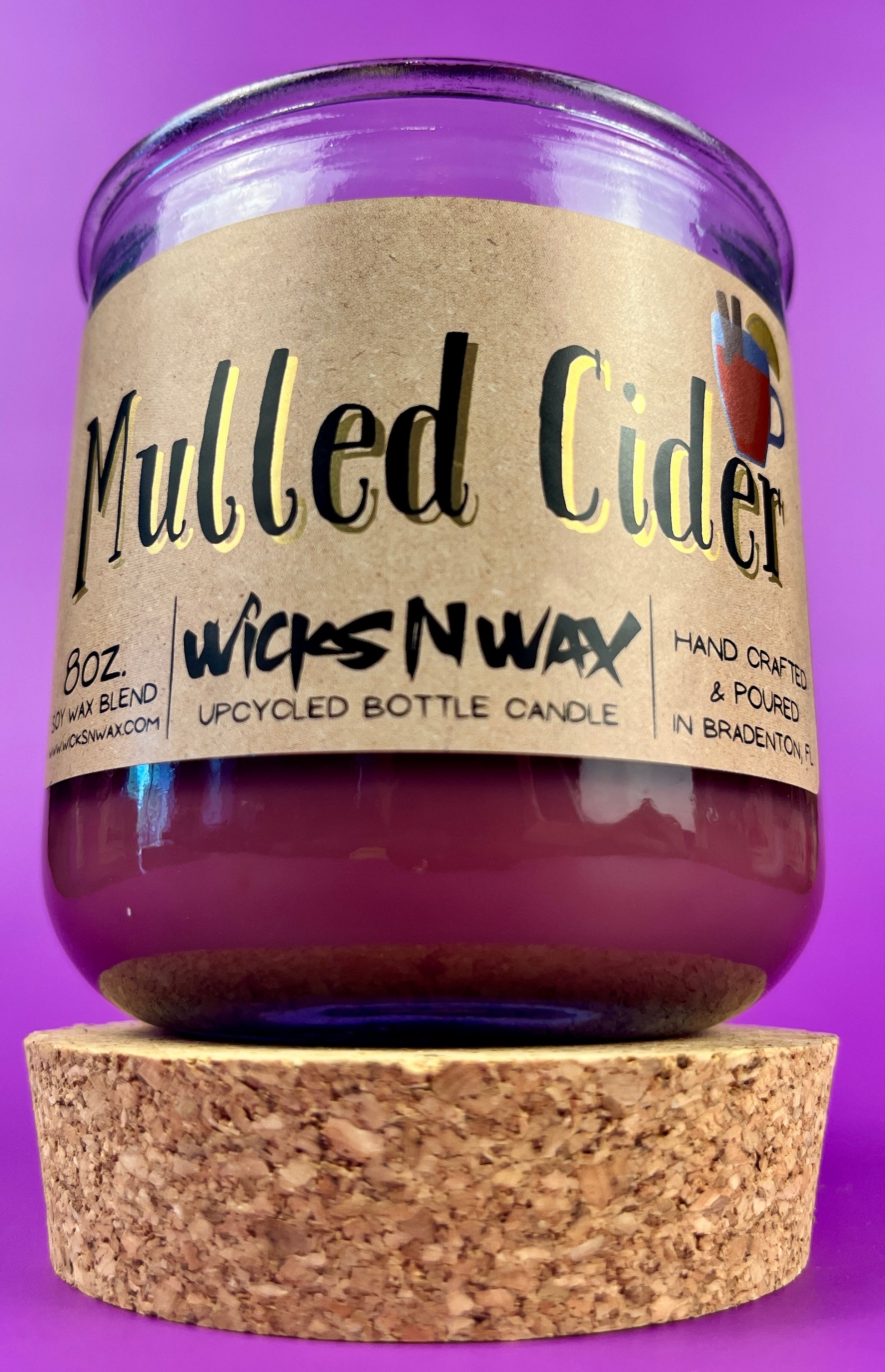 Mulled Cider recycled glass candle with cork base, purple wax, label and wick