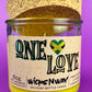 Recycled glass candle jar with cork backing, yellow wax, One Love label.