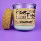 Recycled bottle candle with cork stopper and white wax, front label visible