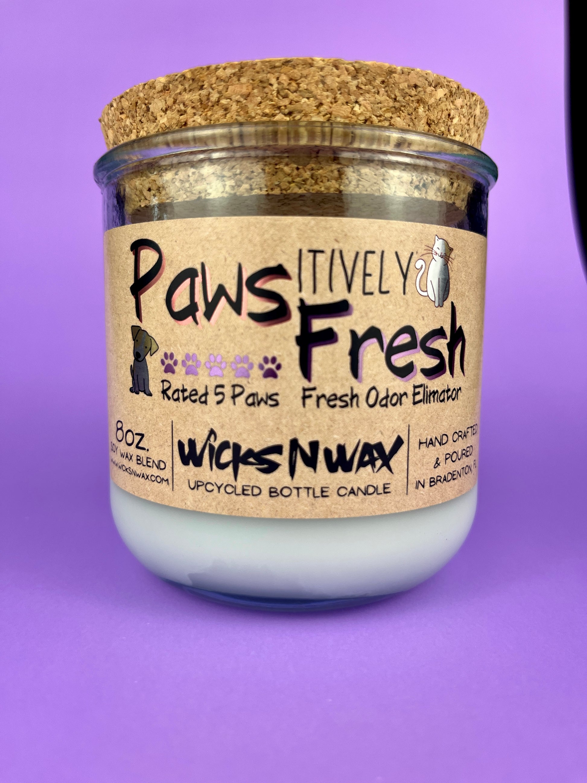 Recycled glass candle with white wax and cork lid, front label in brown and purple
