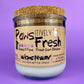Recycled glass candle with white wax and cork lid, front label with pet paw icons