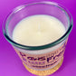 Recycled glass candle with white wax and cork lid, paw-themed front design