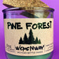 Pine Forest recycled bottle candle in clear glass jar with green wax, cork top
