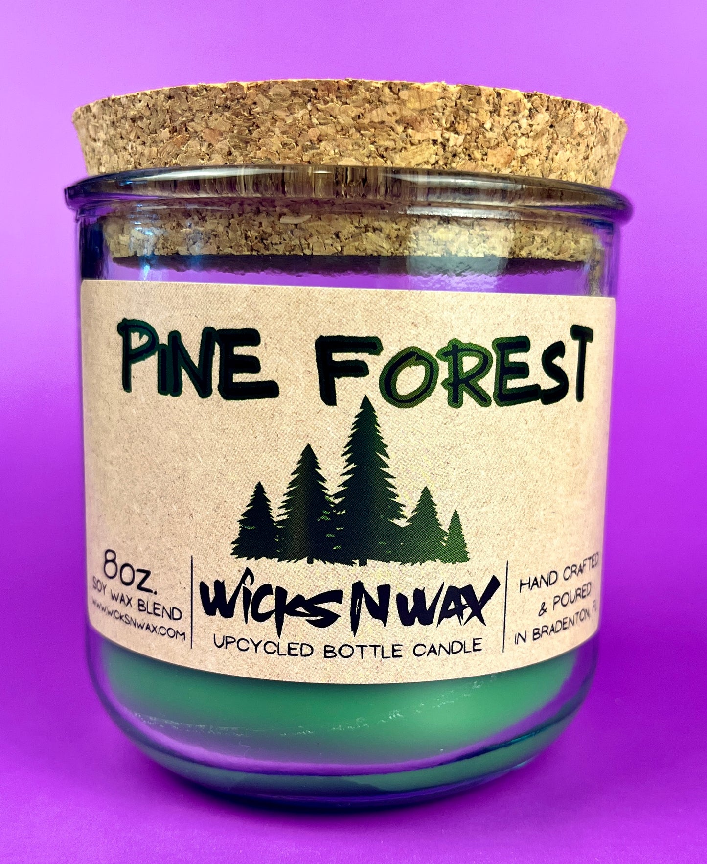 Pine Forest WicksNWax recycled bottle candle with green wax in clear jar