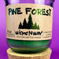 Pine Forest WicksNWax recycled glass candle with green wax in clear jar, front view