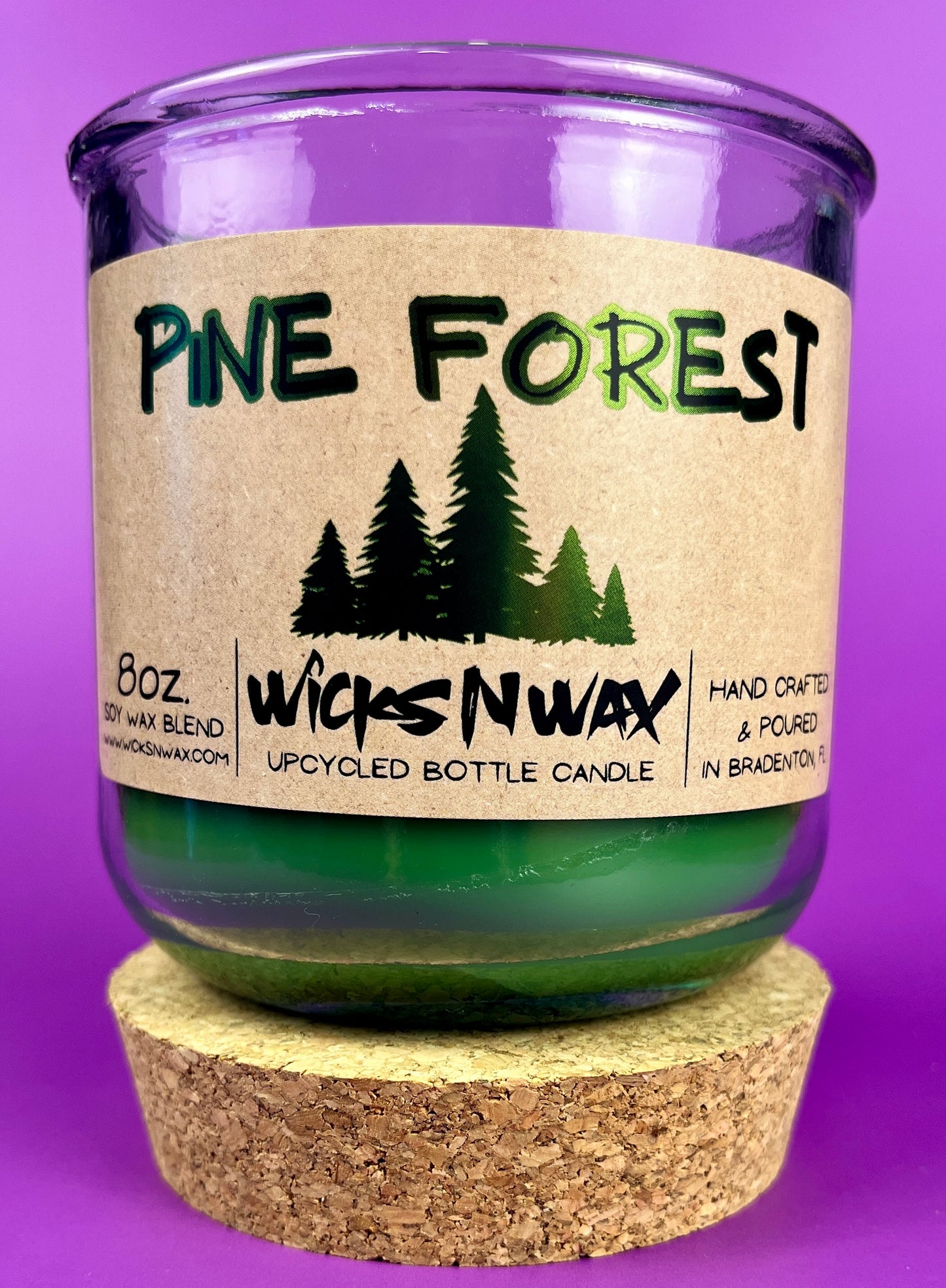 Pine Forest WicksNWax recycled glass candle with green wax in clear jar, front view