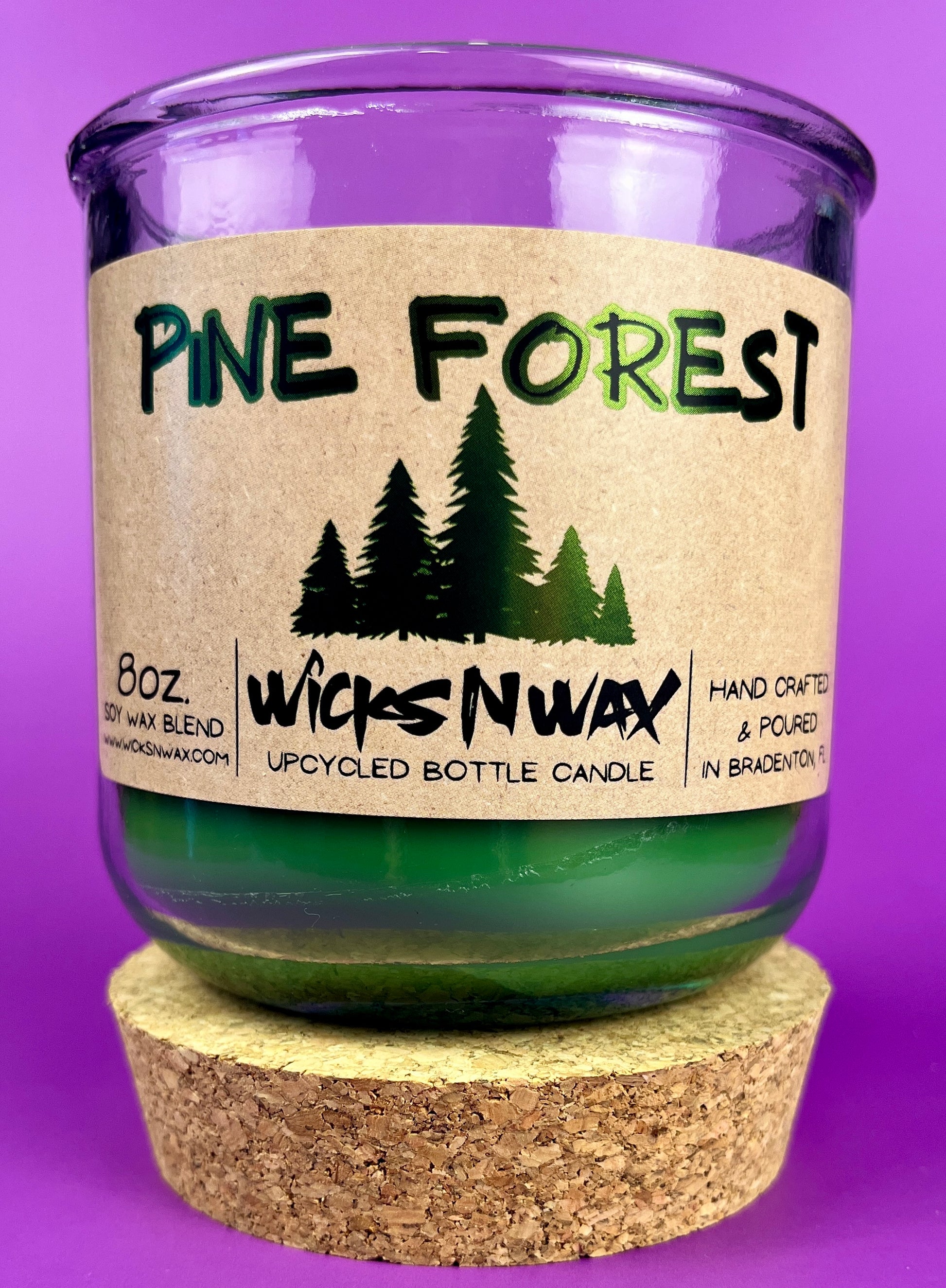 Pine Forest WicksNWax recycled glass candle with green wax in clear jar, front view