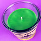 Pine Forest candle in clear glass jar with green wax and visible wick