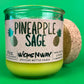 Pineapple Sage recycled bottle candle with cork base, green glass jar, and yellow wax