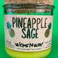 Pineapple Sage recycled bottle candle with cork lid and green glass jar, lime-yellow wax