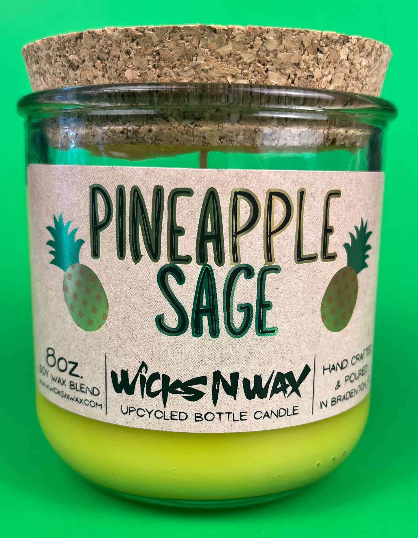 Pineapple Sage recycled bottle candle with cork lid and green glass jar, lime-yellow wax