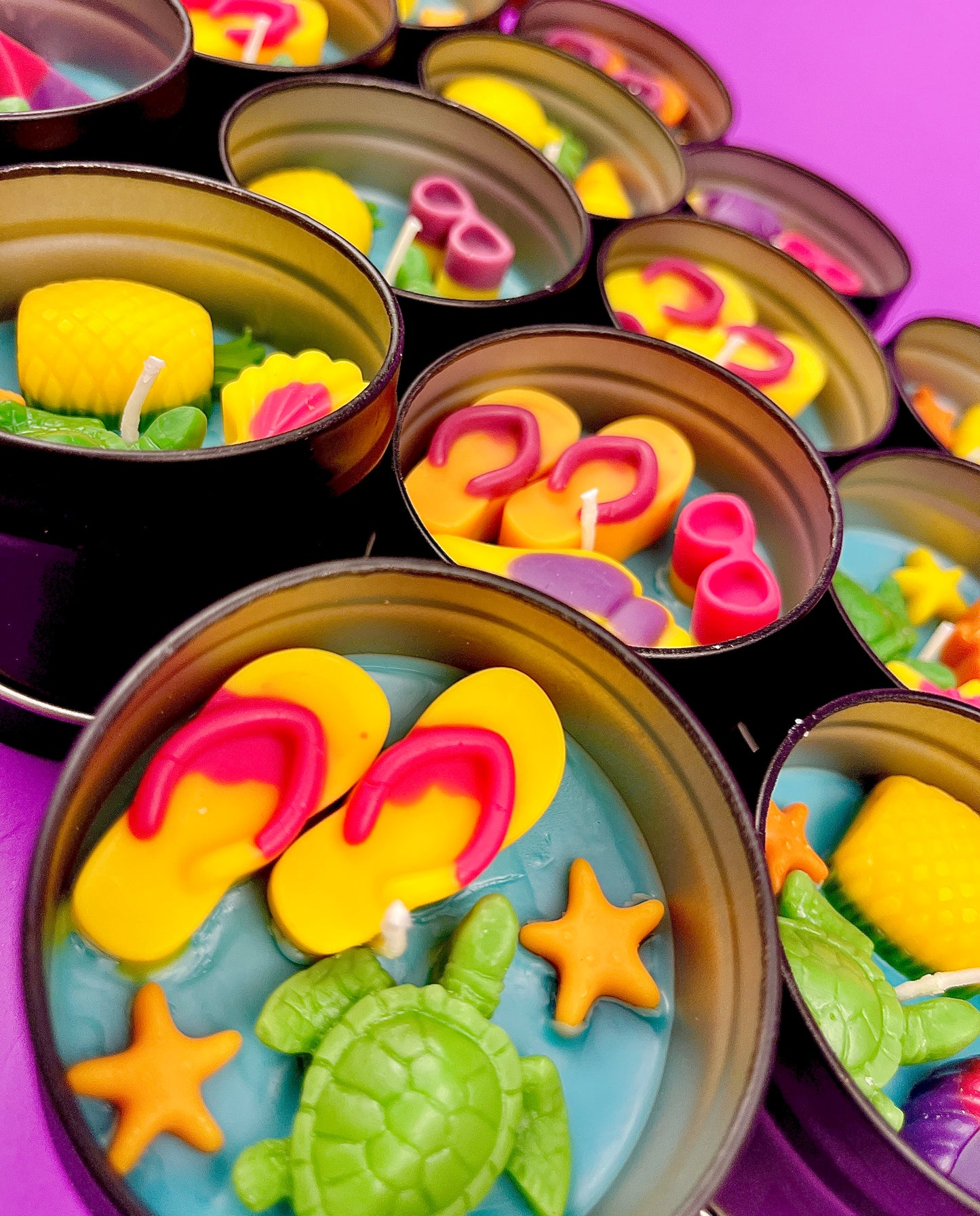 Small sea-themed wax tin close-up with heartlike shapes, starfish, and green turtle