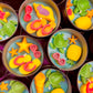 Small sea-themed wax tins featuring starfish, conch shells, and green sea turtles