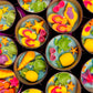 Small sea-themed wax tins filled with starfish, shells, and green sea turtle pieces