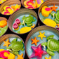 Small WicksNWax sea art tins with blue wax melts, green turtles, and orange starfish