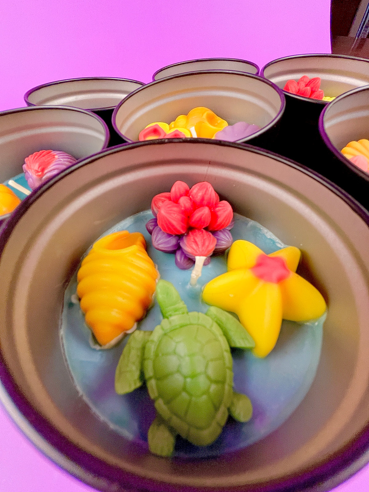 Large Sea Art tin with seashell, starfish and flower wax pieces