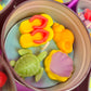 Large Sea Art tin with number-shaped starfish, turtle and seashell wax pieces
