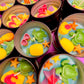 Small sea-themed wax tins with seashells, starfish, and green turtle and lemon shapes
