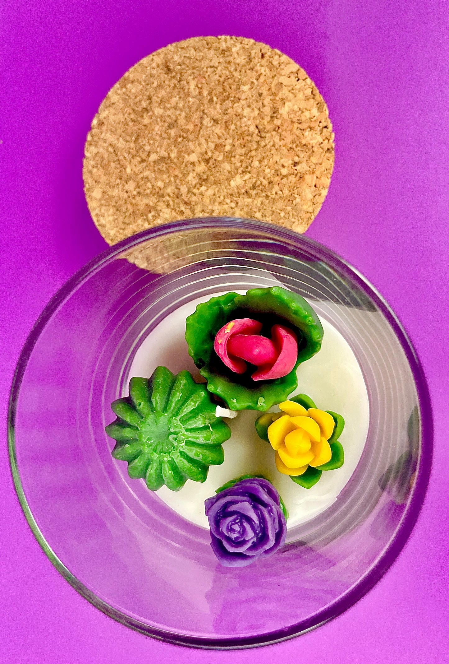 WicksNWax cactus art candle with cork lid and small purple and pink flower wax in glass