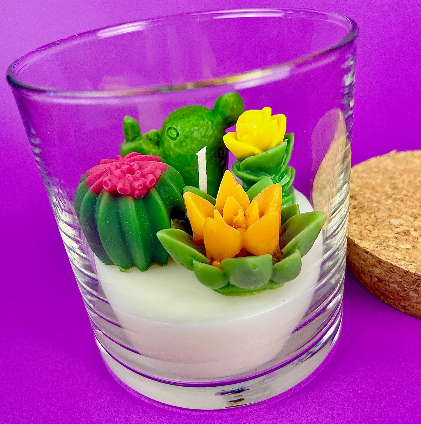 WicksNWax cactus art candle with green cactus and yellow flower wax inside clear glass