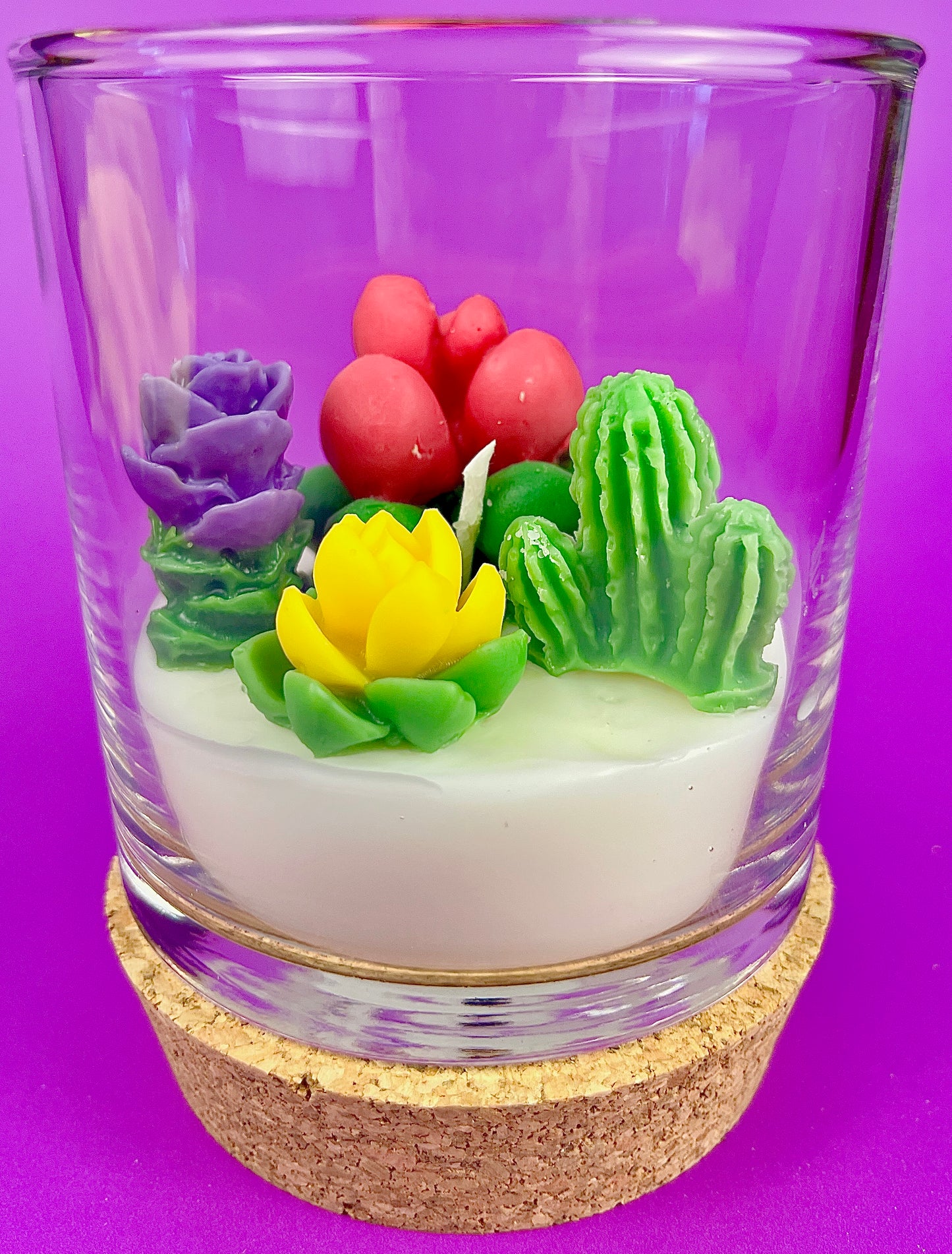 WicksNWax cactus art candle in clear glass with colorful cactus wax flowers and white wax