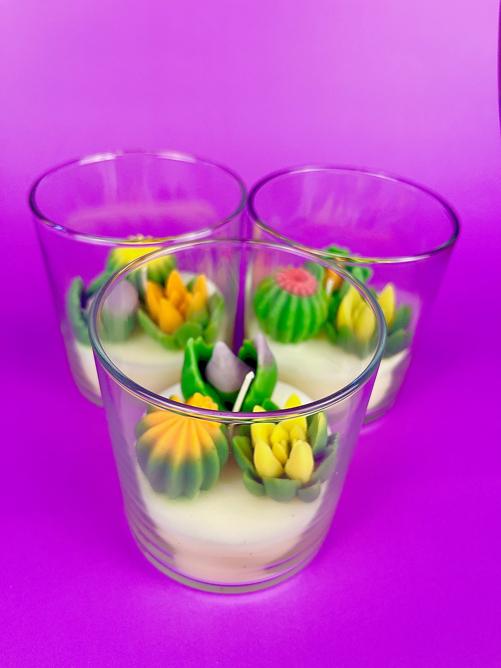 Small cactus art candle: clear glass cup with colorful cactus wax toppers