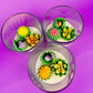 Small cactus art candle set: three clear cups with cactus and flower wax toppers