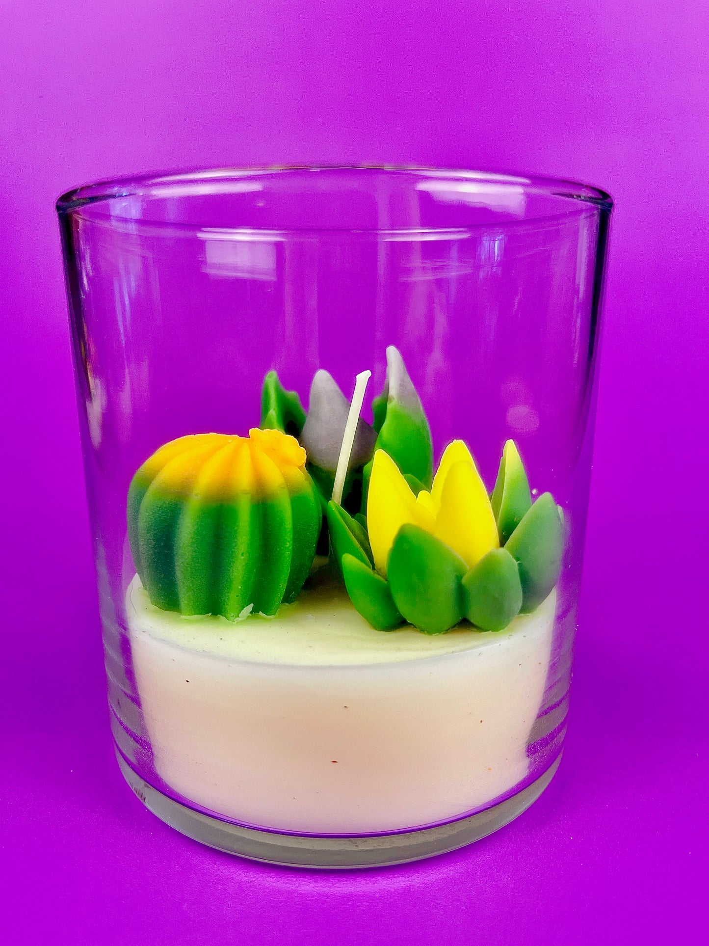 Small cactus art candle: clear glass with green and yellow cactus wax toppers