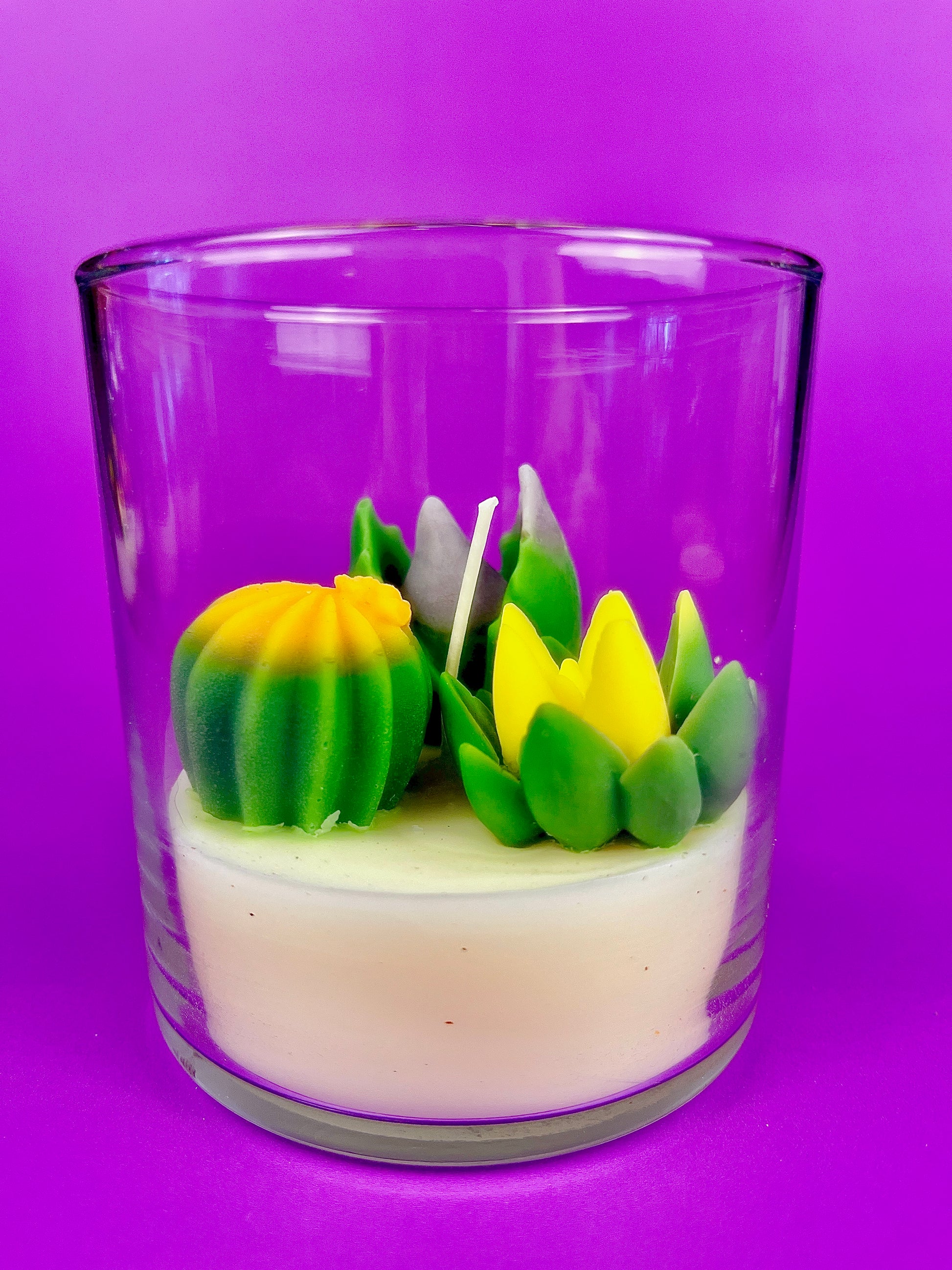 Small cactus art candle: clear glass with green and yellow cactus wax toppers
