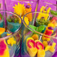 Small scented candle set in clear glass jars with colorful sea-themed wax figures