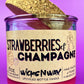 Recycled glass candle with cork base and cork piece, red wax, 'Strawberries & Champagne'.