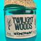 Blue glass candle jar with cork lid and printed Twilight Woods label