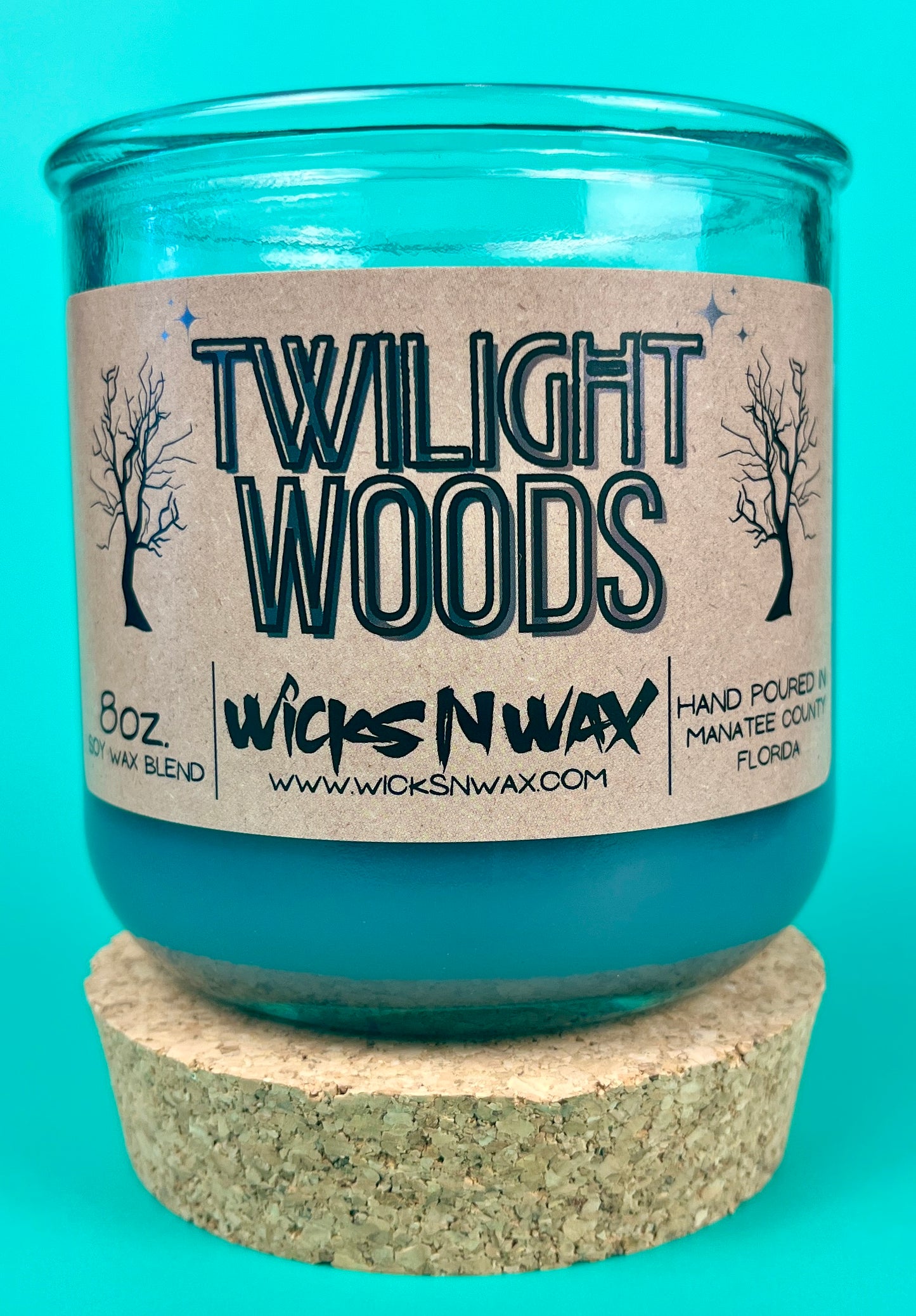 Blue glass candle jar with cork base and Twilight Woods printed label