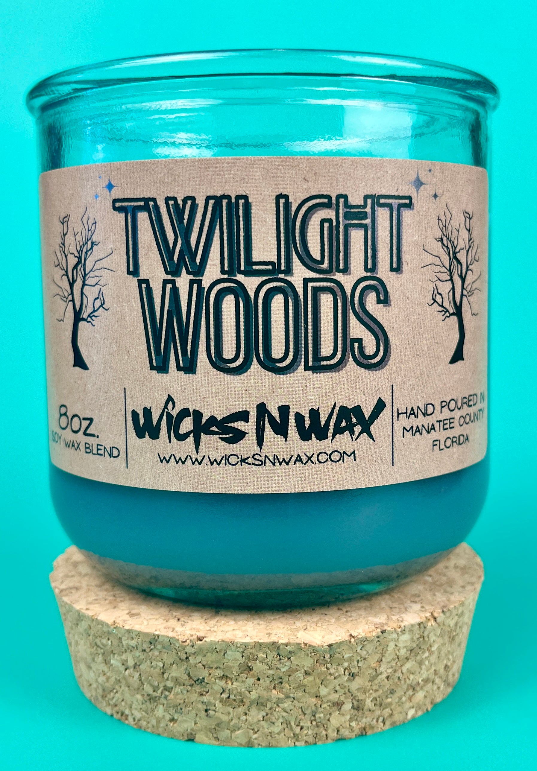 Blue glass candle jar with cork base and Twilight Woods printed label