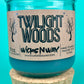 Blue glass candle jar with cork base and Twilight Woods label on front