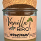 Vanilla Birch recycled glass candle with clear jar, tan wax, and cork lid with kraft label
