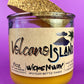 Recycled glass candle jar with Volcano Island label, yellow wax, cork top cover