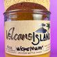 Recycled glass candle jar with Volcano Island label, yellow wax, cork base
